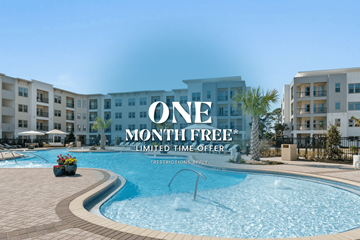 Miramar Beach apartment for rent - A pool surrounded by buildings with a sign that says "One Month Free".