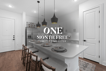 Durham apartment for rent - A kitchen with a white countertop and a sign that says "ONE MONTH FREE* LIMITED TIME OFFER *RESTRICTIONS APPLY".