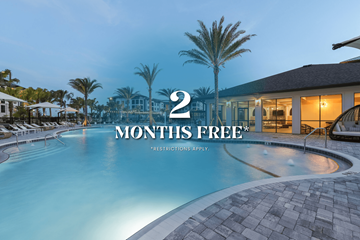 Lakewood Ranch apartment for rent - A pool with a sign that says "2 MONTHS FREE" in the background.