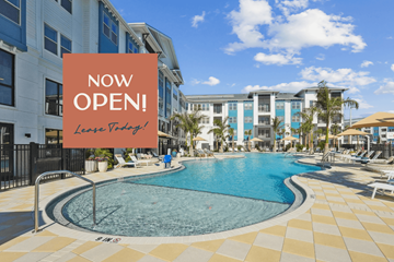 Bonita Springs apartment for rent - A pool area with a sign that says "NOW OPEN! Lease Today!"