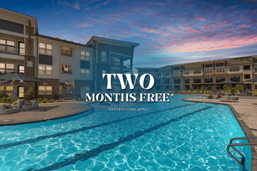 Mooresville townhouse for rent - A swimming pool in front of apartment buildings with the text "TWO MONTHS FREE" prominently displayed.