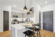 Mckinney apartment for rent - Kitchen with Quartz Countertop and Stainless Steel Appliances.