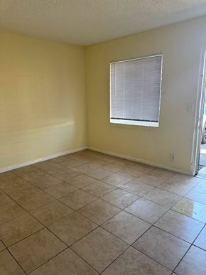 Los Angeles apartment for rent - A room with a window and tiled floor.