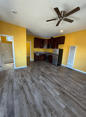 Los Angeles apartment for rent - A room with a ceiling fan and wooden flooring.