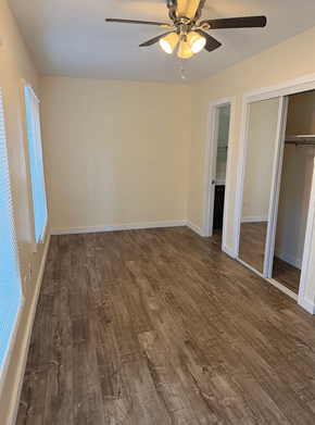 Los Angeles apartment for rent - A room with a ceiling fan and wooden flooring.