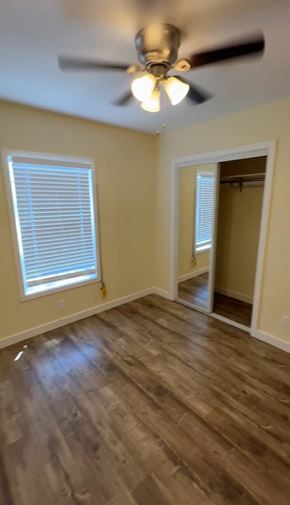 Los Angeles apartment for rent - A room with a ceiling fan and a window with blinds.