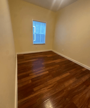Los Angeles apartment for rent - A room with wooden flooring and a window.