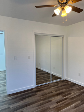 Los Angeles apartment for rent - a bedroom with a closet and a ceiling fan