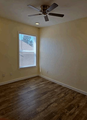Los Angeles apartment for rent - A room with a ceiling fan and wooden flooring.