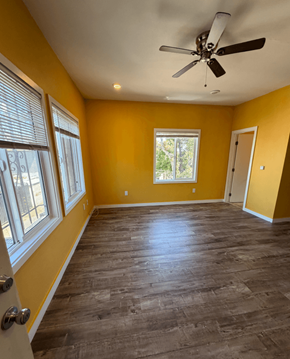Los Angeles apartment for rent - A room with a ceiling fan and a window.