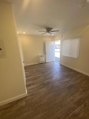 Los Angeles apartment for rent - A room with a ceiling fan and wooden flooring.