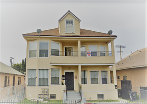 Los Angeles apartment for rent - A two-story house with a balcony on the second floor.