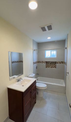 Los Angeles apartment for rent - A bathroom with a sink, toilet, and bathtub.