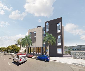 San Pedro apartment for rent - a rendering of a building with cars parked in front of it