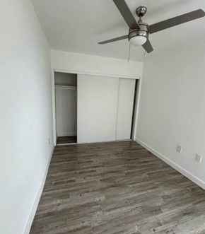 Los Angeles apartment for rent - A room with a ceiling fan and wooden flooring.