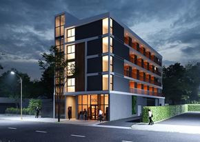 Los Angeles apartment for rent - A modern building with a glass facade and a sign that reads "SOL".