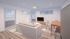 Los Angeles apartment for rent - A modern living room with a large sofa, a television, and a dining table.