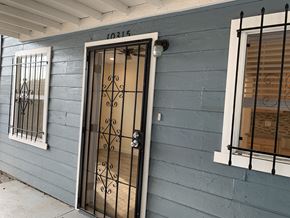Los Angeles apartment for rent - A door with a window on either side.
