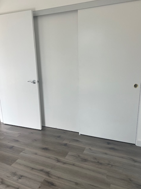 Los Angeles apartment for rent - an empty room with white walls and a wooden floor