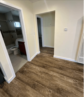 Los Angeles apartment for rent - a bathroom with a wooden floor and a toilet