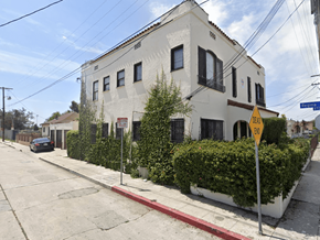 Los Angeles apartment for rent - a white building with a car parked on the street