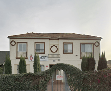 Los Angeles apartment for rent - A leasing office is located in a building with a gated entrance.