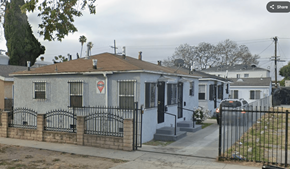 Los Angeles apartment for rent - A house with a red triangle sign on the front.