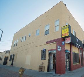 Los Angeles apartment for rent - A building with a Navabros Market sign on the top floor.