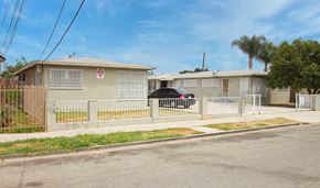 Compton apartment for rent - A red stop sign is on the front of a house.