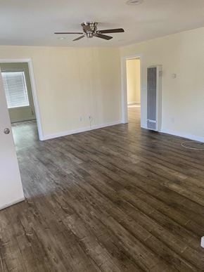 Los Angeles apartment for rent - A room with wooden flooring and a ceiling fan.