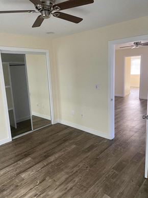 Los Angeles apartment for rent - A room with a ceiling fan and wooden flooring.