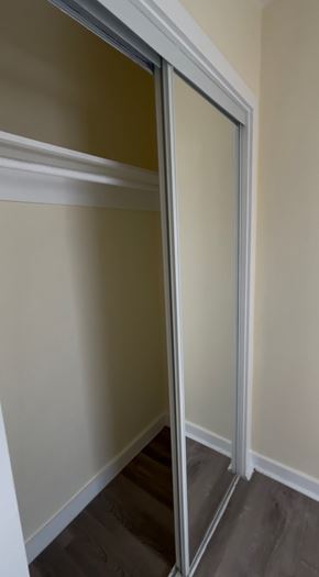 Los Angeles apartment for rent - A sliding door in a room with a white wall.