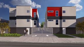 Los Angeles apartment for rent - Two people stand in front of a grey and red building.