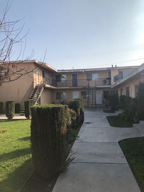 Compton apartment for rent - A sunny day at a residential building with a clear blue sky.