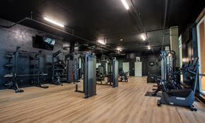 Los Angeles apartment for rent - A gym with a variety of equipment including treadmills, weights, and exercise machines.