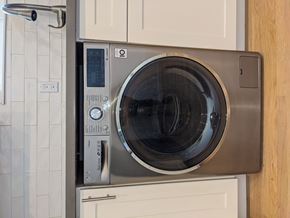 Oakland apartment for rent - a front loading washer and dryer in a kitchen