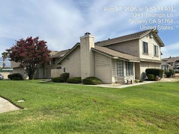 Ontario apartment for rent - A house with a tree in front of it.