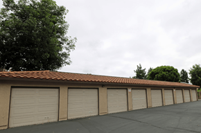 Ontario apartment for rent - A long row of garage doors are closed.