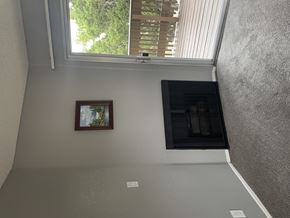 West Covina apartment for rent - A picture frame is hanging on the wall in a room.