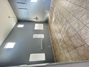 Victorville house for rent - A bathroom with a tiled floor and walls.