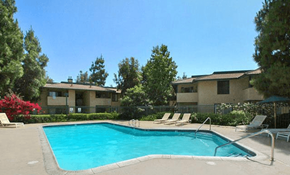 Ontario apartment for rent - a swimming pool in front of an apartment building