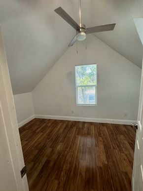 Pomona house for rent - a room with hardwood floors and a ceiling fan