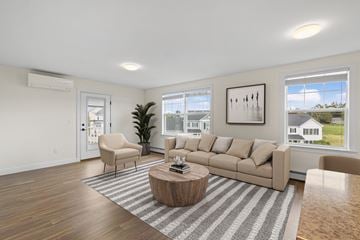 Westbrook apartment for rent - a living room with a couch and a coffee table