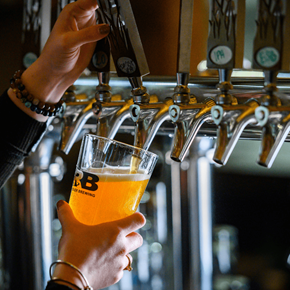 Scarborough apartment for rent - Bartender pouring craft beer from tap at Hackamore North Apartments, Scarborough