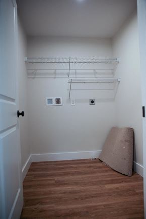 Brunswick apartment for rent - a bedroom with a futon and a shelf on the wall