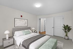 Westbrook apartment for rent - a white bedroom with a bed and a white closet