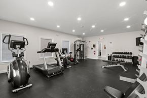 Brunswick apartment for rent - the gym with treadmills and weights at the belgard apartments