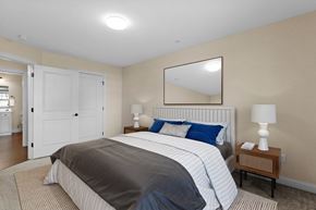 Cumberland Foreside apartment for rent - a bedroom with a bed and a mirror on the wall