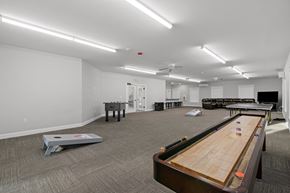 Cumberland Foreside apartment for rent - a game room with a shuffleboard table and a foosball