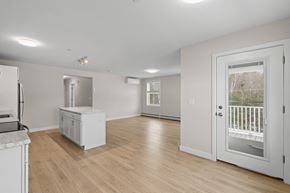 Scarborough apartment for rent - A white kitchen with a refrigerator, a counter, and a dishwasher.
